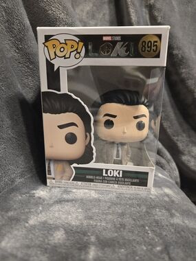 Funko Loki Pop! Vinyl Figure - White Box with Black and Green Accents